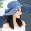 Women's wide brim straw sun hat in blue with stylish side bow knot decoration - M (56-58cm) / Navy Polka Dot