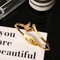 Elegant 18k gold butterfly open bracelet with small zircon on minimalist card - Gold