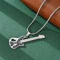 Hip hop style silver necklace with black and white bass guitar pendant on green texture - Guitar Bass Pendant