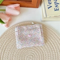 Floral canvas card holder with heart button pocket and zipper in a cozy setting - Colorful Floral