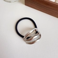 Minimalist elastic hair tie with silver geometric oval metal charm on white texture - Triple Row Silver