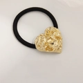 Elastic black hair tie with a vintage golden wrinkled heart metal charm accessory - Heart Lava Rock Gold