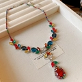 Detailed view of Y-shaped necklace featuring colorful pear and marquise cut crystals - Necklace / Colorful