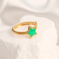 Close-up of golden adjustable ring featuring a vibrant green enamel star on stone - Adjustable Open / 18K Gold Plated Star Green
