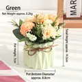 Artificial carnation plant in light green ceramic pot with twine bow and soft pink petals - Potted Green Artificial Flower Ornament