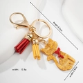 Süßer Katzen-Schlüsselanhänger mit Quasten und orangefarbenem Anhänger, 9,5 cm Länge - Gold