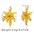 Detail view of gold 3D flower earrings with size dimensions 3cm x 2cm and weight 6.6g - KE0390
