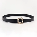 Detail of slim black PU belt featuring a gold square buckle with sparkling rhinestones - Black
