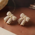 Eleganti orecchini a fiocco dorati con perle bianche in stile vintage chic francese - Fiocco con Perla Oro
