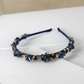 Macro shot of dark blue crystal headband with hand-set stones and velvet lining - Style SJ002 / Blue