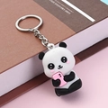 Niedlicher Panda-Schlüsselanhänger aus Silikon mit einem kleinen rosa Spielzeug-Handy - Panda Mit Rosa Handy