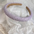 Detail of lavender lace headband showing intricate floral pattern and anti-slip lining - Light Purple