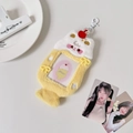 Detail of a pudding plush card holder with white cream topping and red cherry charm - Yellow