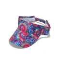 Detail view of colorful tie-dye visor cap with 100% polyester fabric care label - Multicolor Spiral Psychedelic Tie-Dye Style (E)