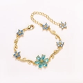 Luxurious gold bracelet with blue flower petals and small diamond-studded leaves - Gold-Blue
