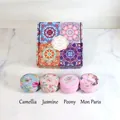 Bohemian style soy wax scented candle gift set with four distinct floral tin containers - Style B (Camellia/Jasmine/Peony/Mon Paris)