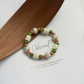 Handmade Jingdezhen ceramic beaded bracelet featuring green and pumpkin shaped beads - 938F Avocado Milk Jelly