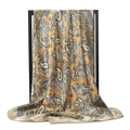 Yellow paisley print satin silk scarf draped elegantly on a display stand - 90x90cm / Gold Paisley