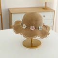 Close-up of girls straw sun hat featuring floral embroidery and wavy hollow edges - Straw Hat / Straw Hat - Khaki