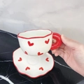 Cute ceramic coffee cup with red heart pattern and wavy rim on matching saucer - 180ML / Red Heart