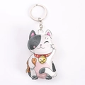 Cute faux leather lucky cat keychain with golden bell and fish charm on white background - Lucky Cat - Surplus Yearly