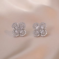 Silver four-leaf clover stud earrings with clear zircon stones on champagne silk - Silver Four-Leaf Clover Micro-Pave Style (E0520)