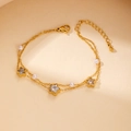 Double-layered gold titanium bracelet with star pendants, crystals, and white pearls - Pearl Clear Zircon
