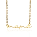Macro shot of gold Mama script pendant on O-chain necklace with clear reflection - Necklace / Gold