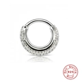 Macro shot of S925 sterling silver nose ring with sparkling paved zircon stones - Platinum (#4 Rhinestone Half Hoop)