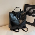 Mochila clásica de cuero sintético negro brillante con cierre de giro plateado - Bolso Individual / Negro
