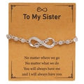 Detailed view of silver infinity sister bracelet with micro-set zircons on brown card - Sister Style (X269)