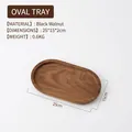 Oval black walnut wood serving tray with natural grain finish measuring 25x15x2cm - Solid Black Walnut Oval Tray 25*15*2cm