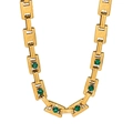 Macro detail of gold-plated chunky link chain necklace with emerald green round gemstones - Single Zirconia Necklace - Embossed Texture (CK801)