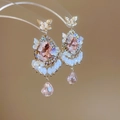 Detailed close-up of pink crystal tassel earrings with golden butterfly and beads - Gold Pink (19#)