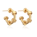 Créoles en forme de C plaquées or 18 carats avec détails de noix hexagonales chic - Doré