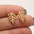 Minimalist gold leaf stainless steel studs shown on fingers for size perspective - Leaf / Gold