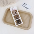 Three-piece set of matte brown gradient mini hair claws on a textured display tray - 3Pcs Claw Clip Set-Pumpkin Shape / Coffee Brown Series