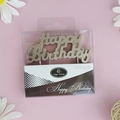 Silver Happy Birthday letter candles in transparent box on a soft pink background - Rose Gold