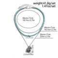 Men's retro layered necklace set with turquoise beads and silver metal pendant charms - Silver