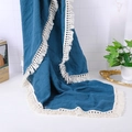 Detail of navy blue muslin baby blanket with white lace fringe and crinkle texture - 80*65 cm / Dark Blue