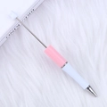 Pink and white gradient DIY beadable ballpoint pen with silver metal tip on plush background - Pink & White