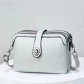 Light blue lychee grain leather crossbody bag with three zipper layers and top handle - Light Gray