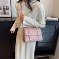 Chic pink crossbody bag with top handle and adjustable strap in textured PU leather - Pink