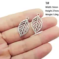 Detail view of silver hollow leaf pendant with dimensions 14x27mm for jewelry making - 1# Hollow Leaf