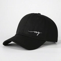 Close-up of the high-quality white NY embroidery on a black cotton twill baseball cap - One Size / Black