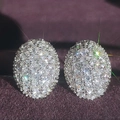 Hollow oval stud earrings featuring micro-pave cubic zirconia in silver-tone metal - Silver
