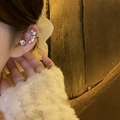 Close-up of elegant silver ear cuff set with shiny cubic zirconia and white pearls - Right Ear Clip (Single) / Silver