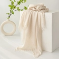 Elegant beige cotton linen scarf draped on white cube with minimalist floral decor - Off-white