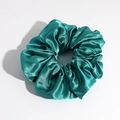 Detailed close-up of emerald green satin scrunchie showing smooth silk texture and pleats - Dark Green Small