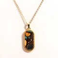Detail of 14k gold plated tarot style pendant featuring colorful abstract enamel patterns - Black Background Colorful Lines (Style 5)
